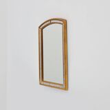 Mirror by Deknudt with marbled fume glass side panels in gilded wooden fram