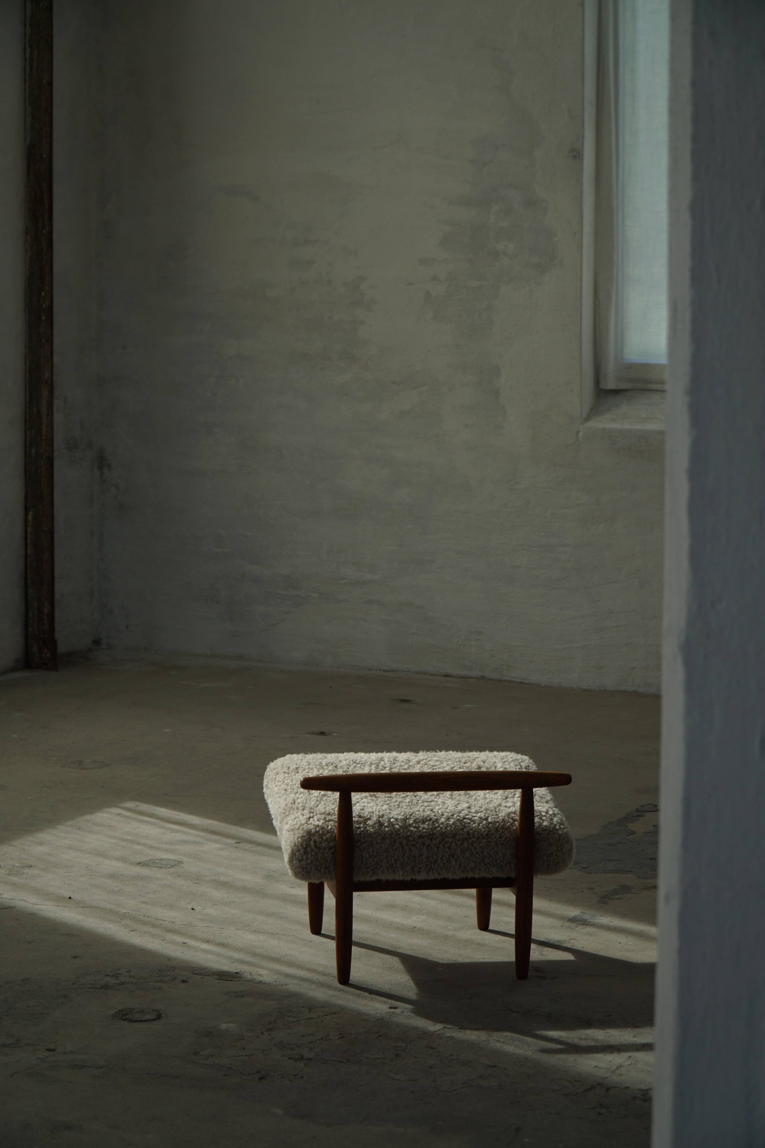 Eivind A. Johansen, oak footrest with light lambswool padding for FDB Møbler