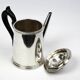 Christofle teapot in silver-plated metal, with a blackened wood handle — late 19th century, early 20th century.
