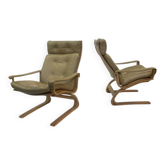 Ensemble de deux fauteuils vintage 1970 cuir et bois design danois