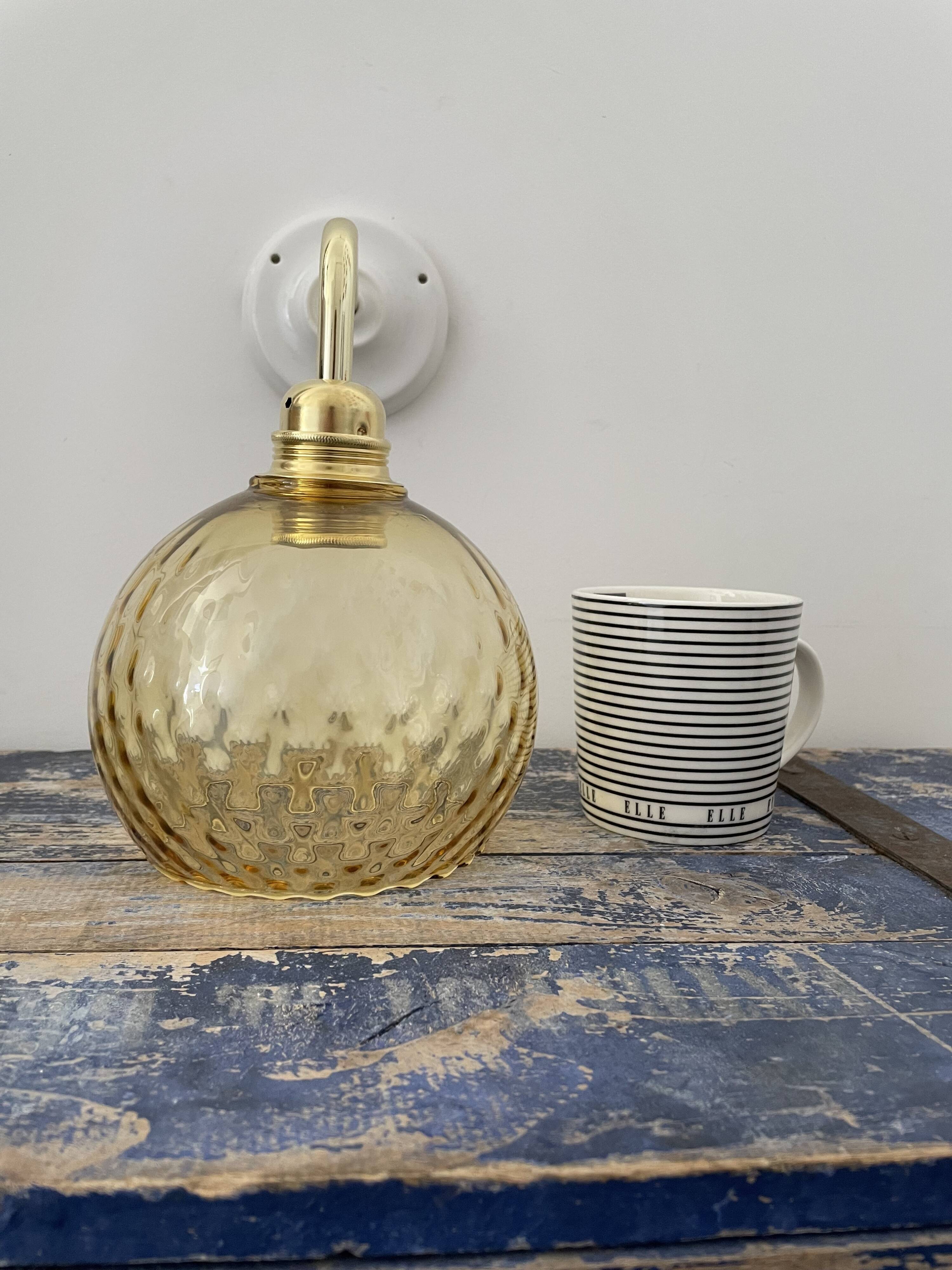 New electrified golden globe wall lamp