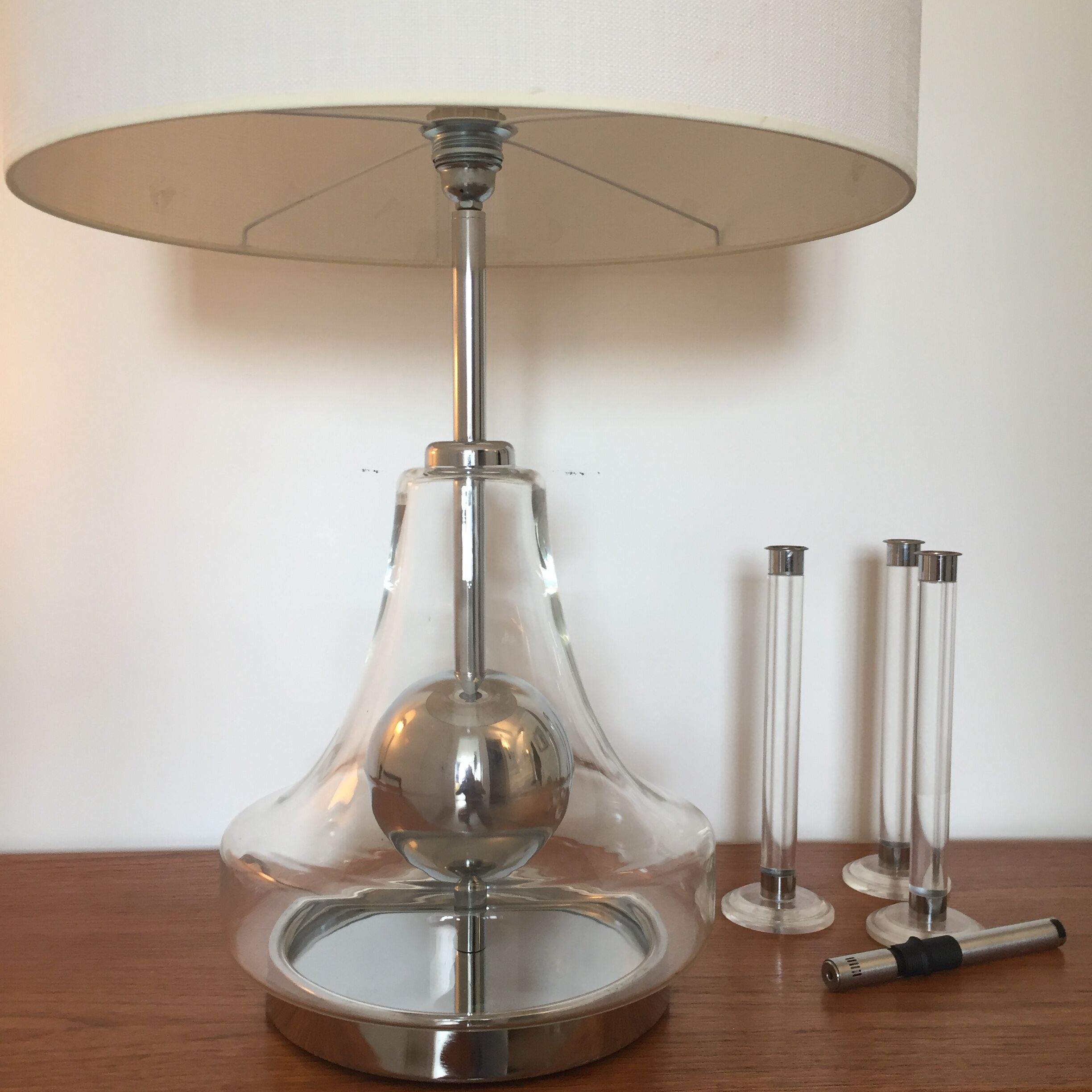 Serie of three candlesticks in Plexiglas and metal 1970
