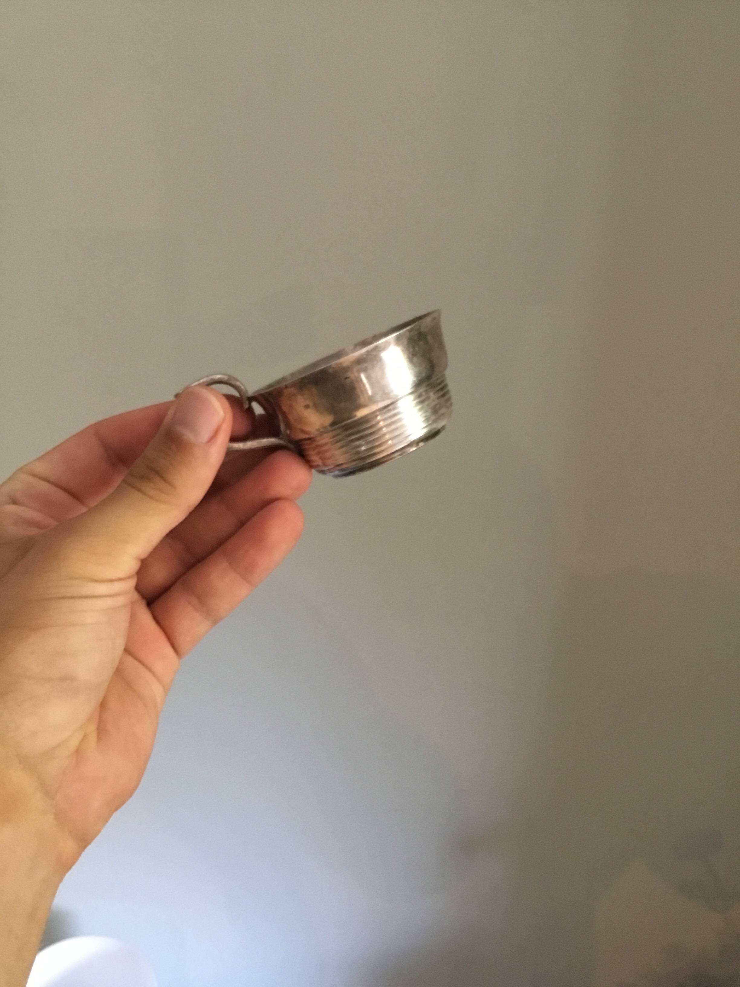 small silver-plated metal cup