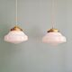 Pair of Art Deco pendant lights in white opaline.