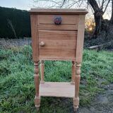 Raw wood bedside table