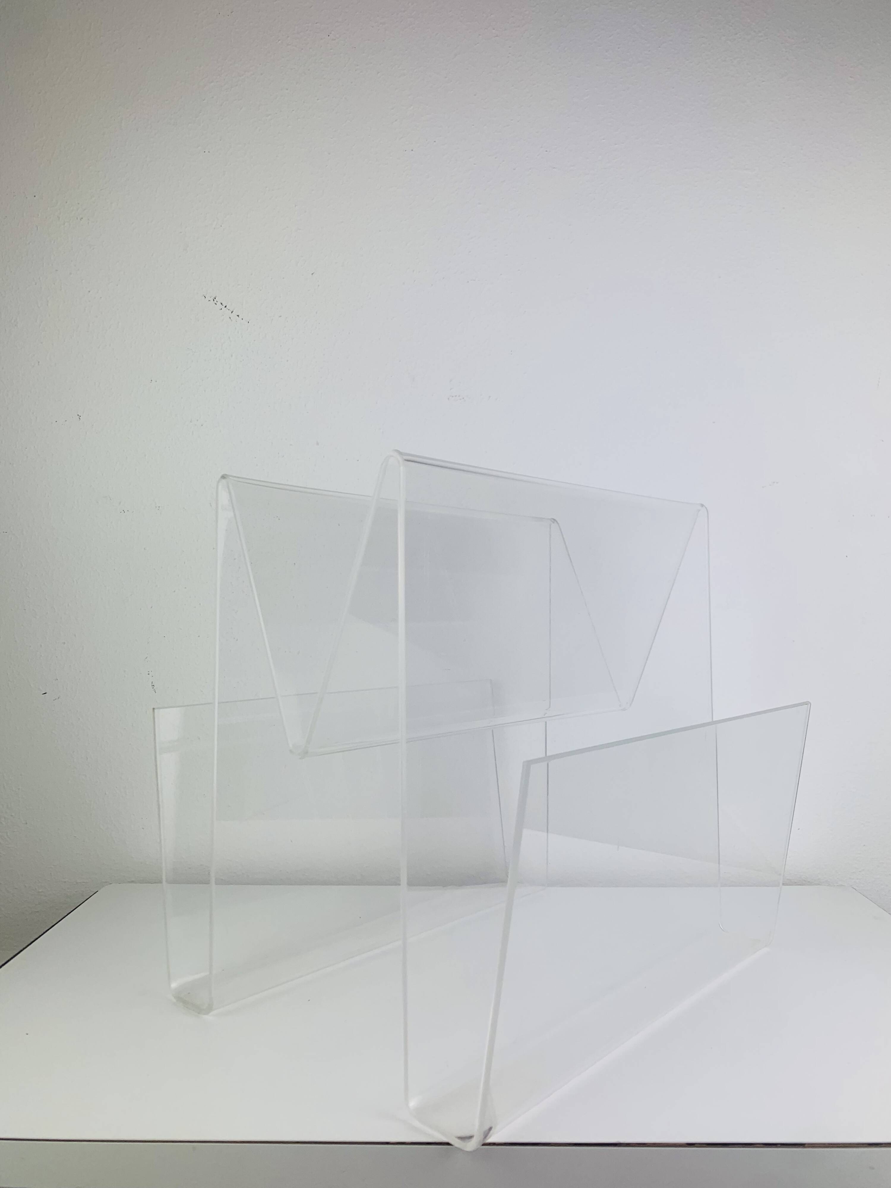 Acrylic magazine rack from the 70s.