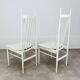 2 Scandinavian slatted chairs, white, from the 1960s.