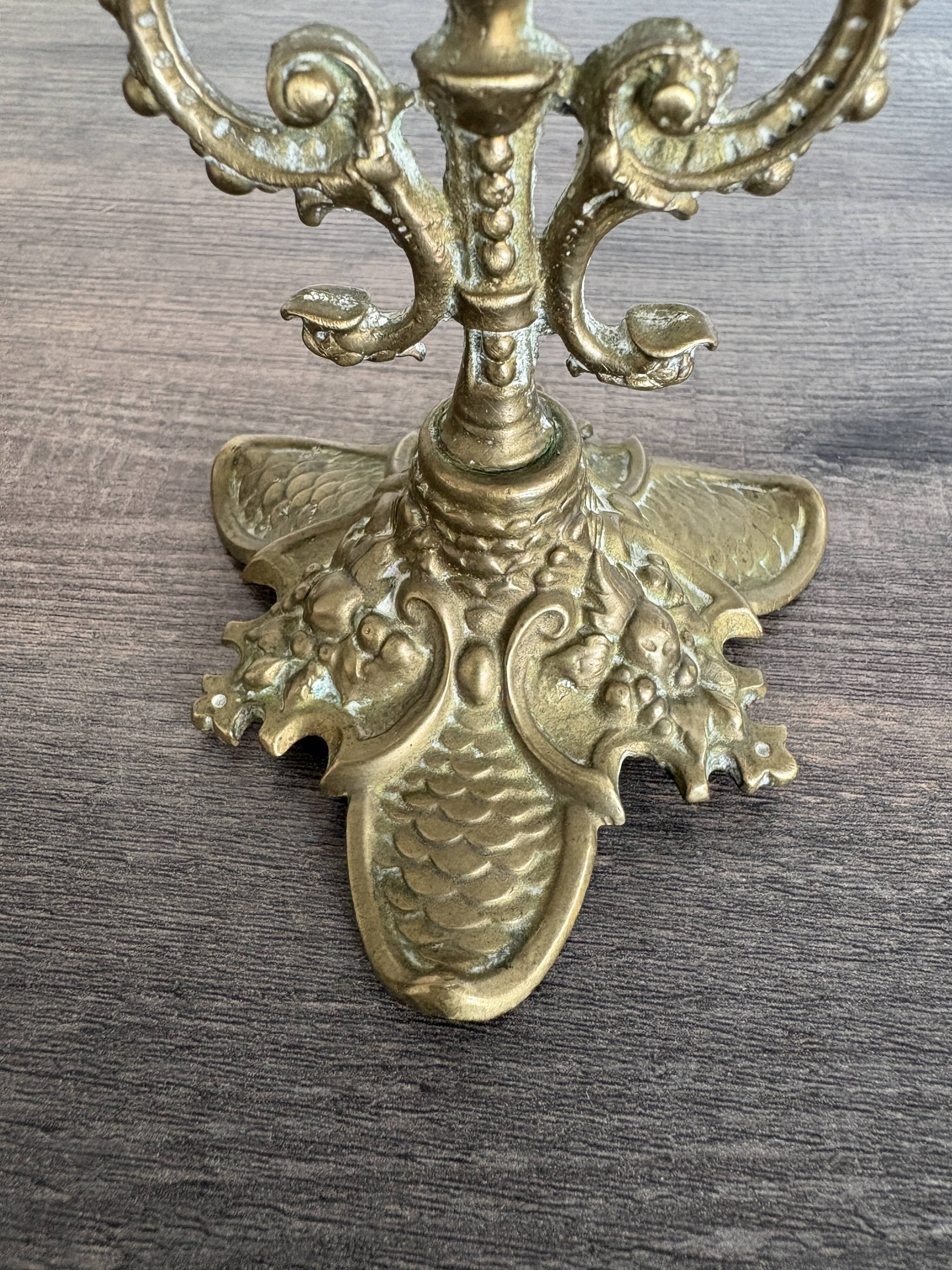 Antique chiselled bronze candlestick