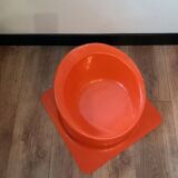 Vintage orange plastic children's armchair