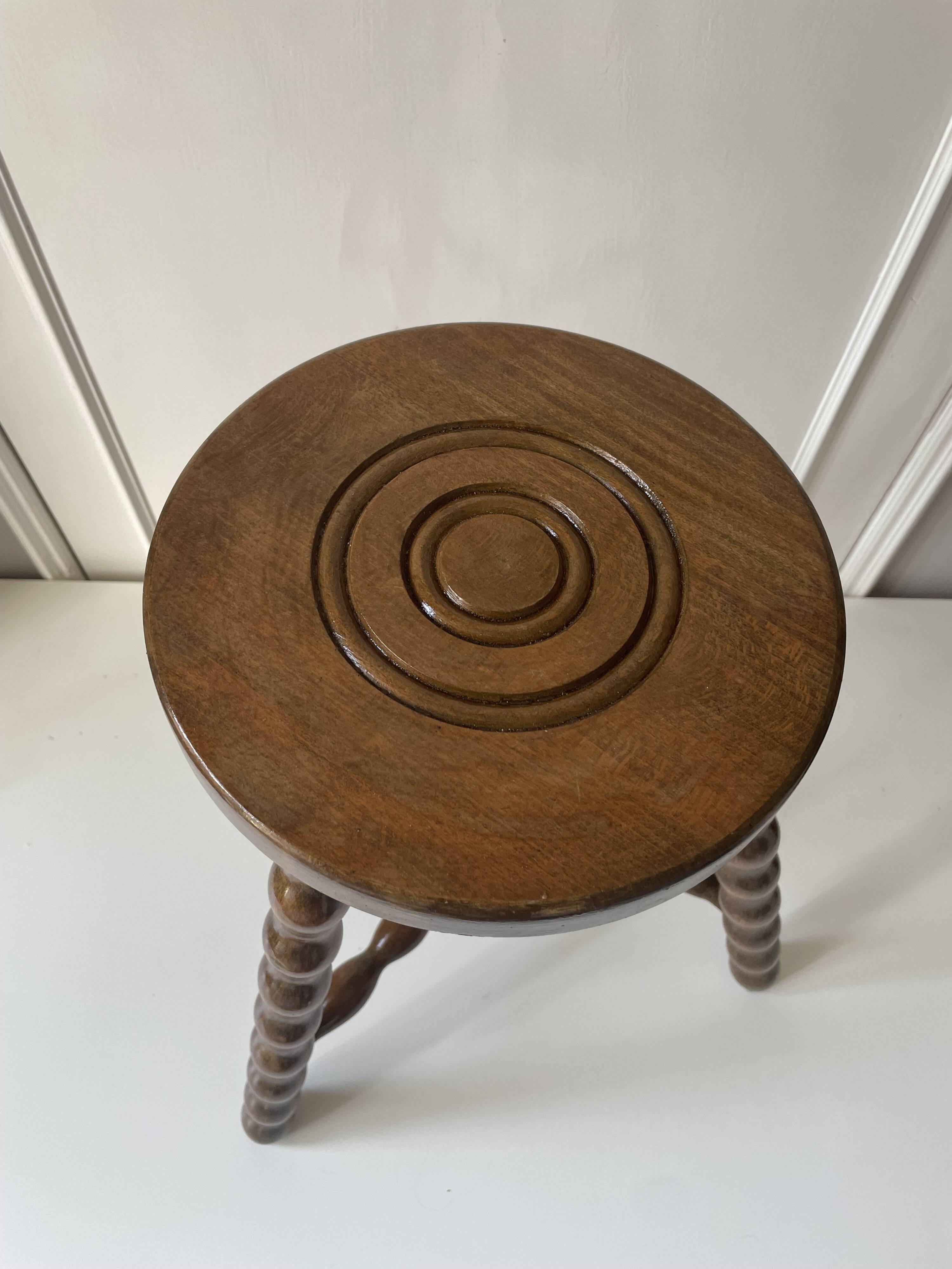 Wooden tripod stool