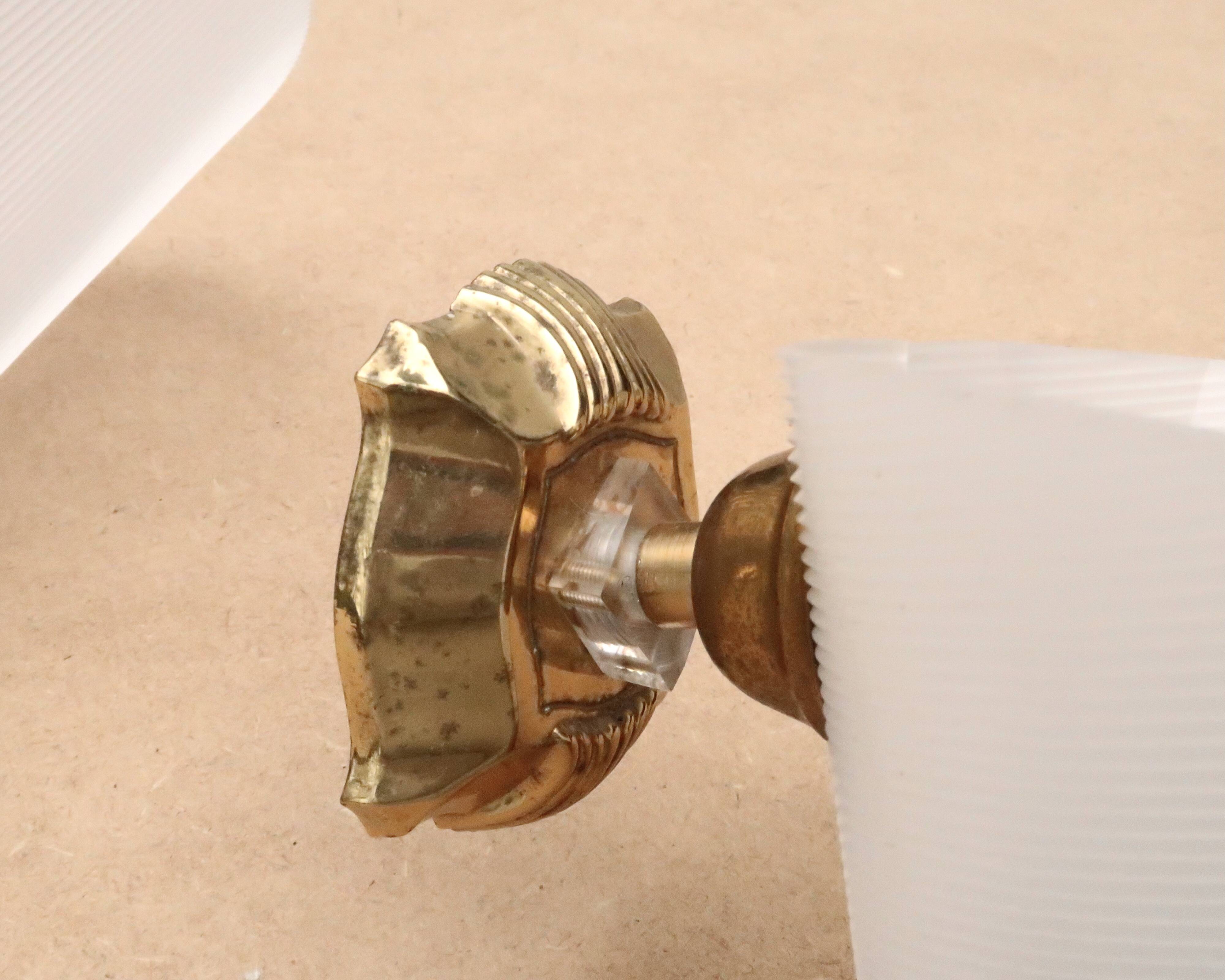 Pair of white and gold wall lights, 1950s