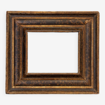 17th century frame decorated with foliage with illuminations Italy
