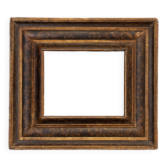 17th century frame decorated with foliage with illuminations Italy