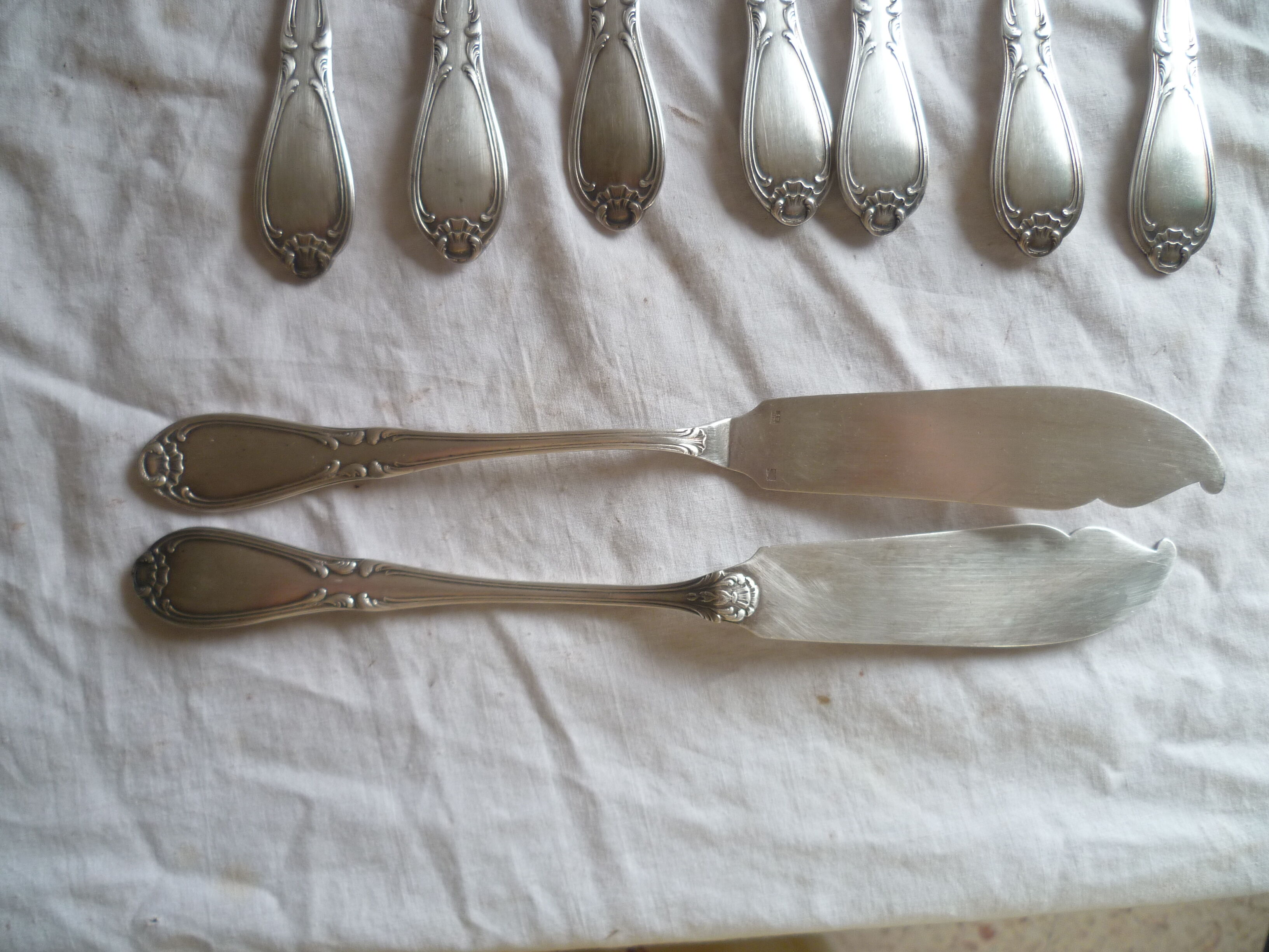 Ens. from 9 fish knives met. argente 1st title "au bon marche" mod.coquille