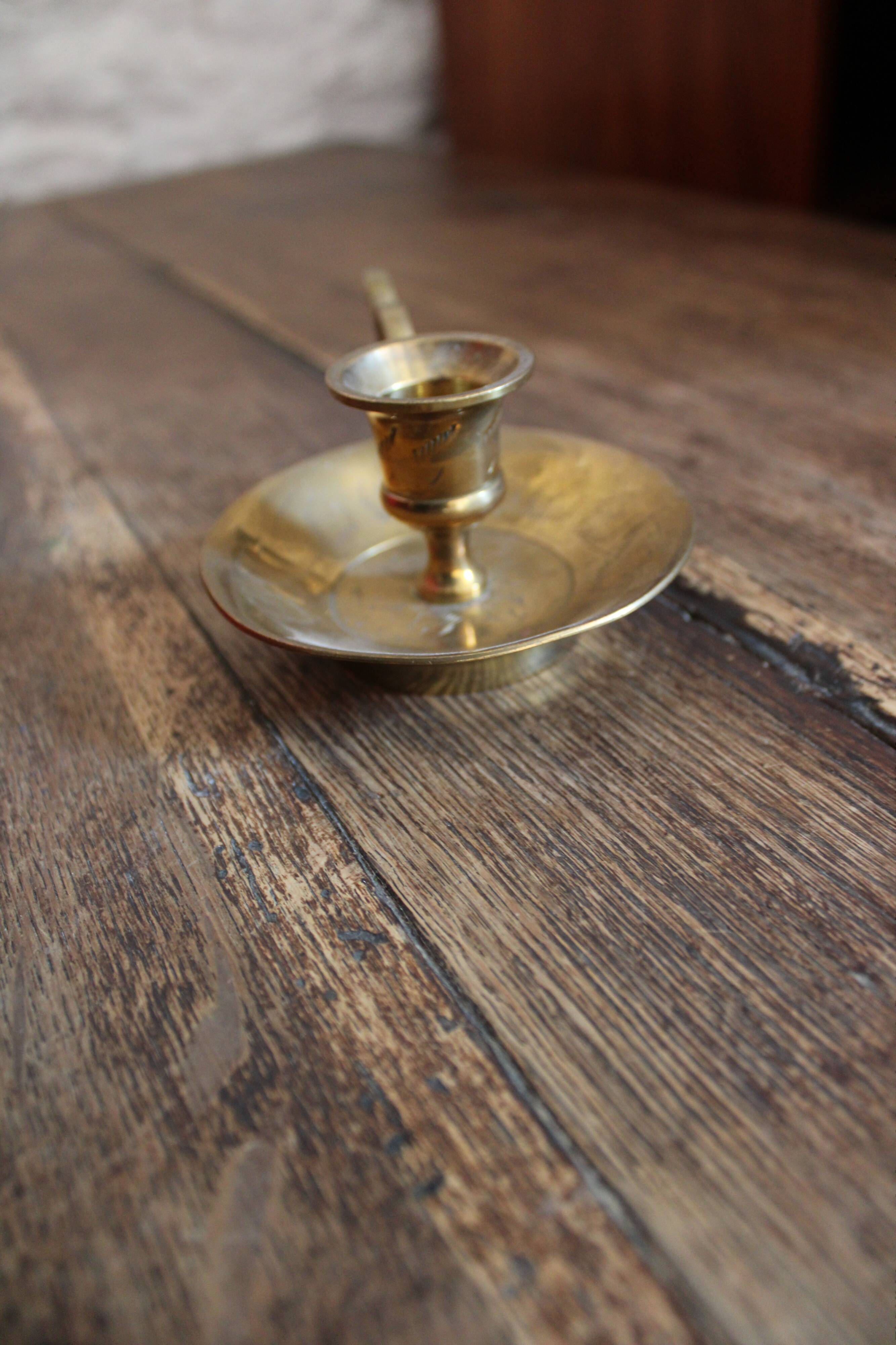 Brass cellar rat candlestick