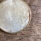 Lot of mother-of-pearl aperitif items, 7 coasters and a dish.