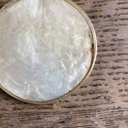 Lot of mother-of-pearl aperitif items, 7 coasters and a dish.