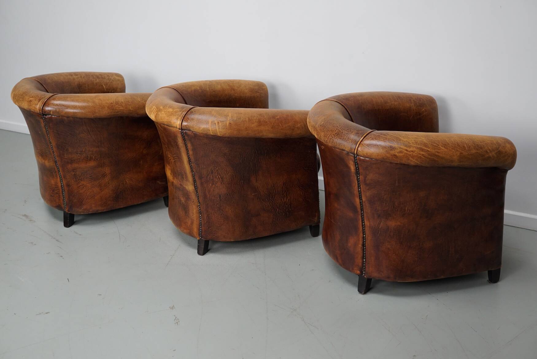 Fauteuils club vintage hollandais en cuir cognac, lot de trois