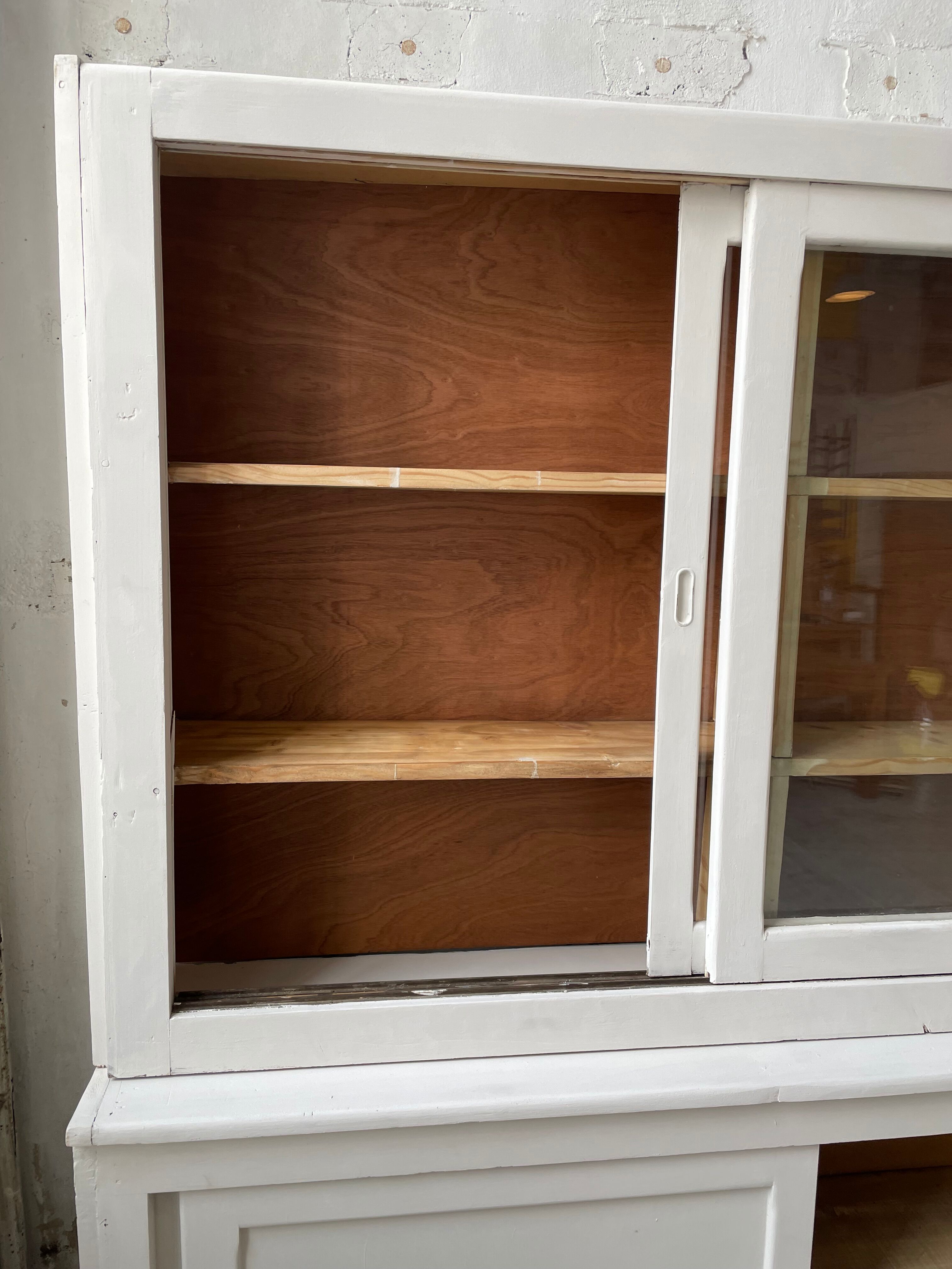 Library showcase ivory white sliding doors