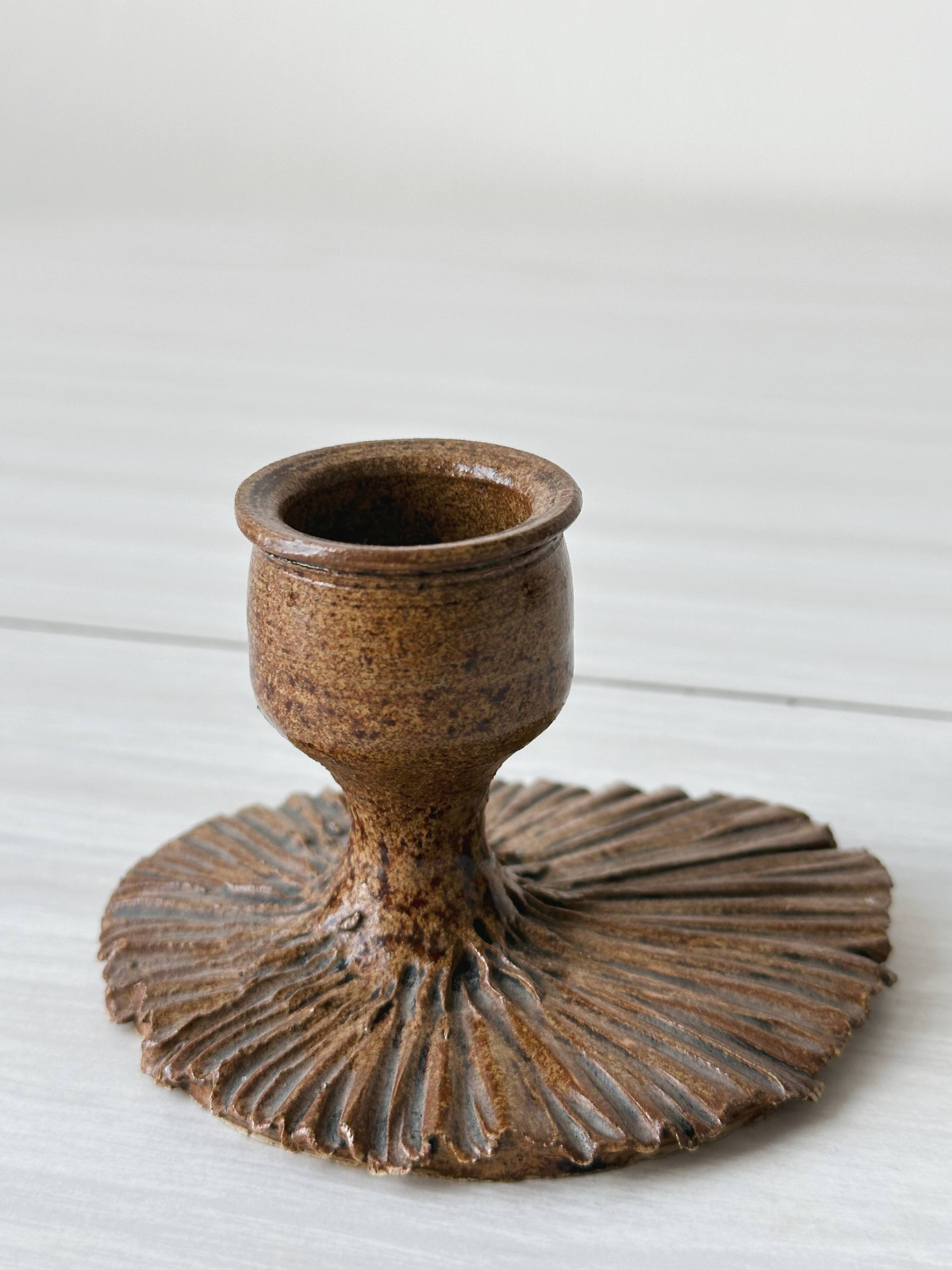 Atypical brown ceramic candle holder