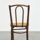 Bistro chair with a woven cane seat
