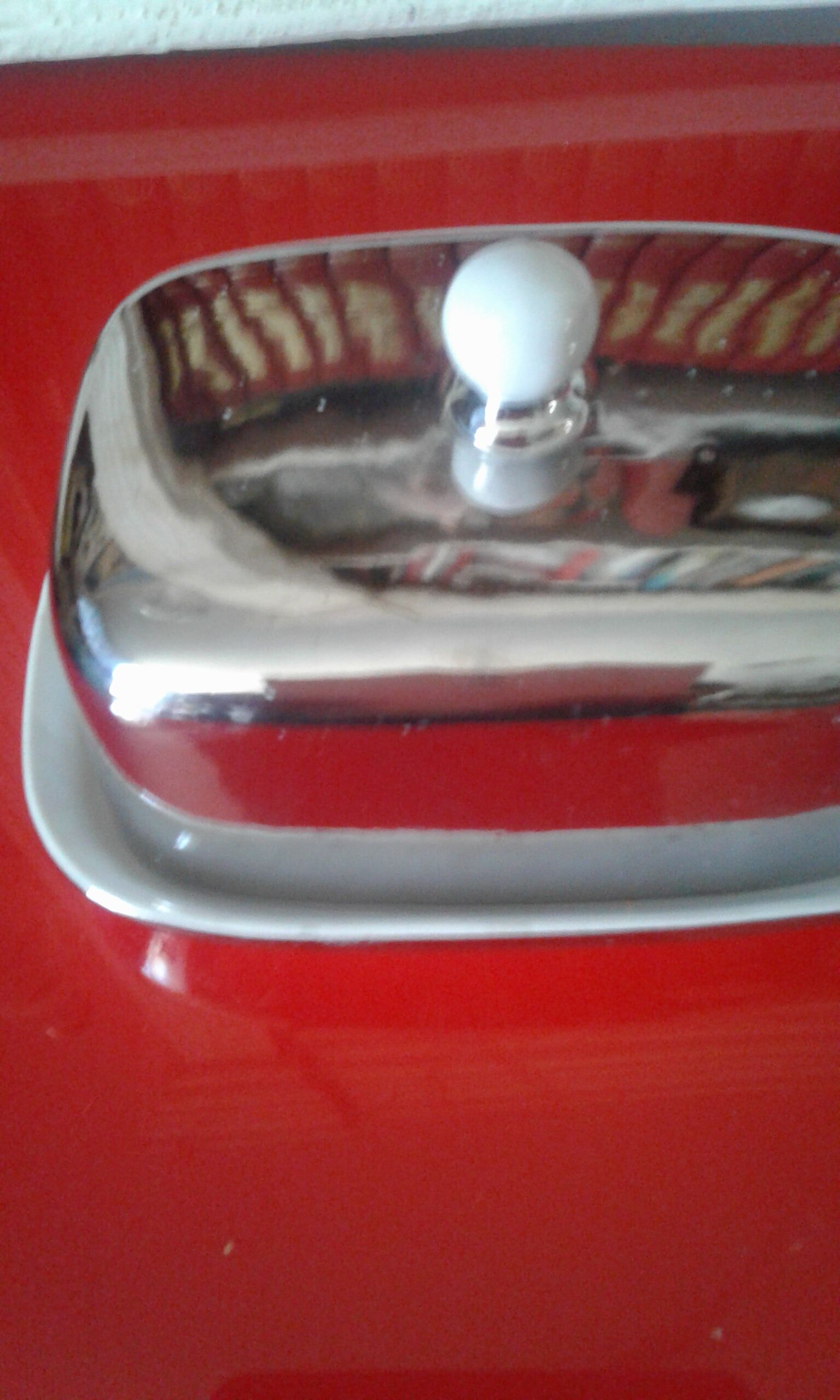 White and silver ceramic butter dish