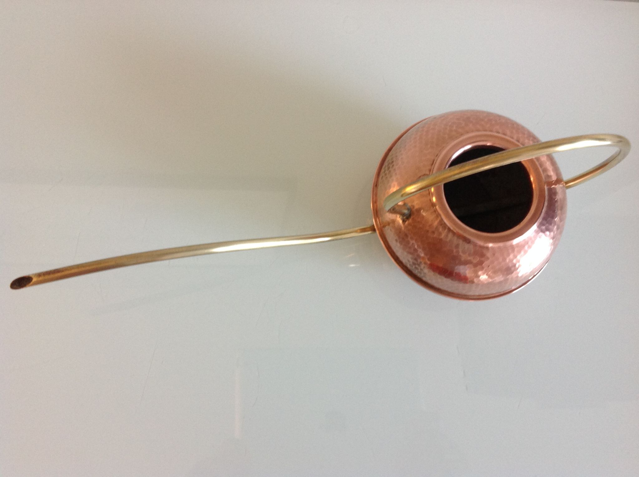 Red copper watering can in Scandinavian style 60s-70s