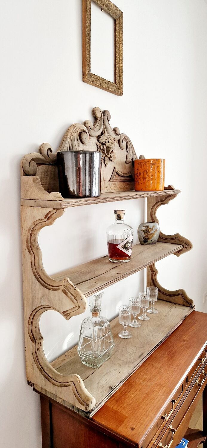 Old wall shelf carved in walnut