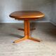 Vintage oval teak Scandinavian table with a central star base from Glostrup.