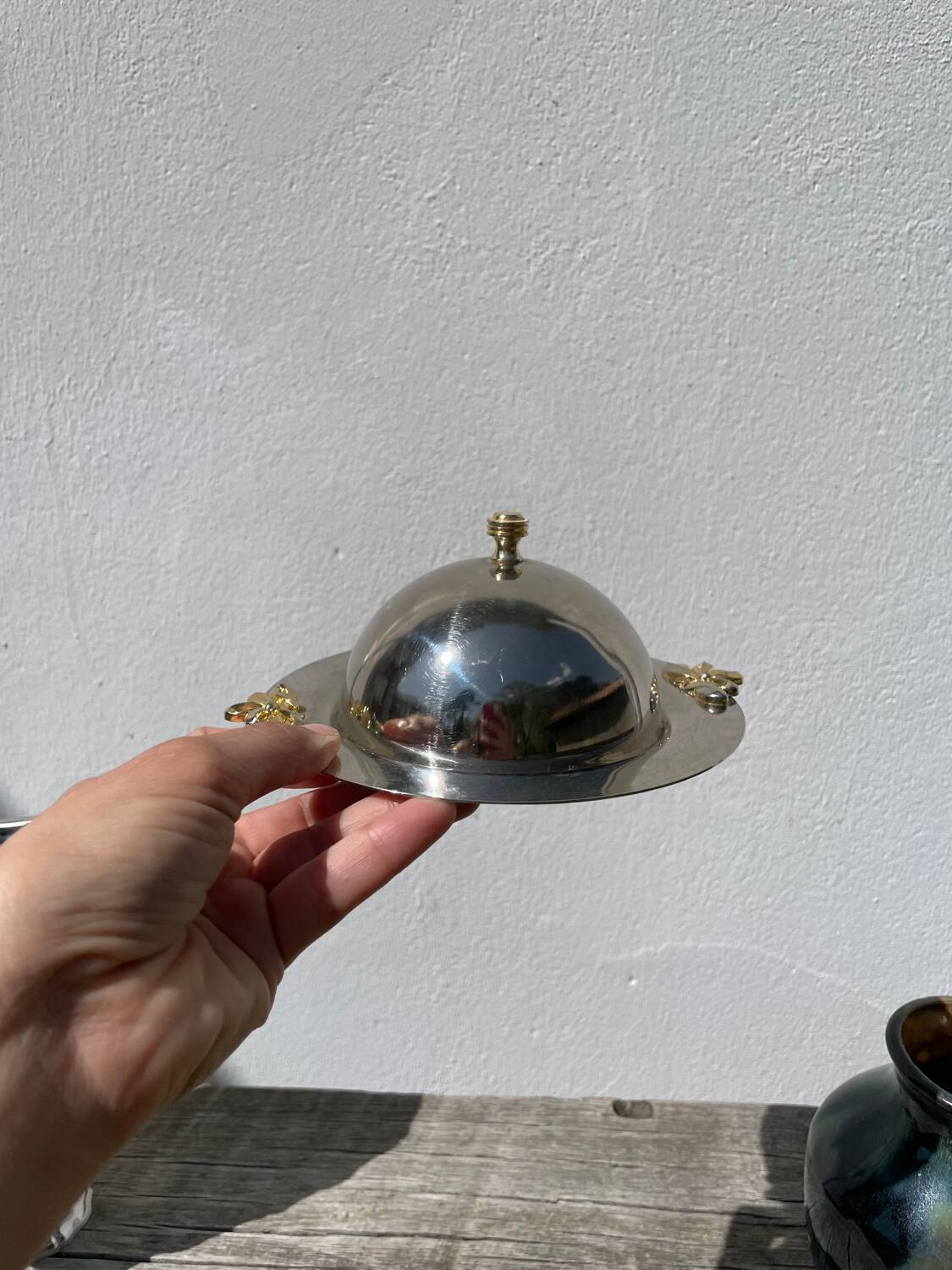 Silver-plated metal butter dish with knots