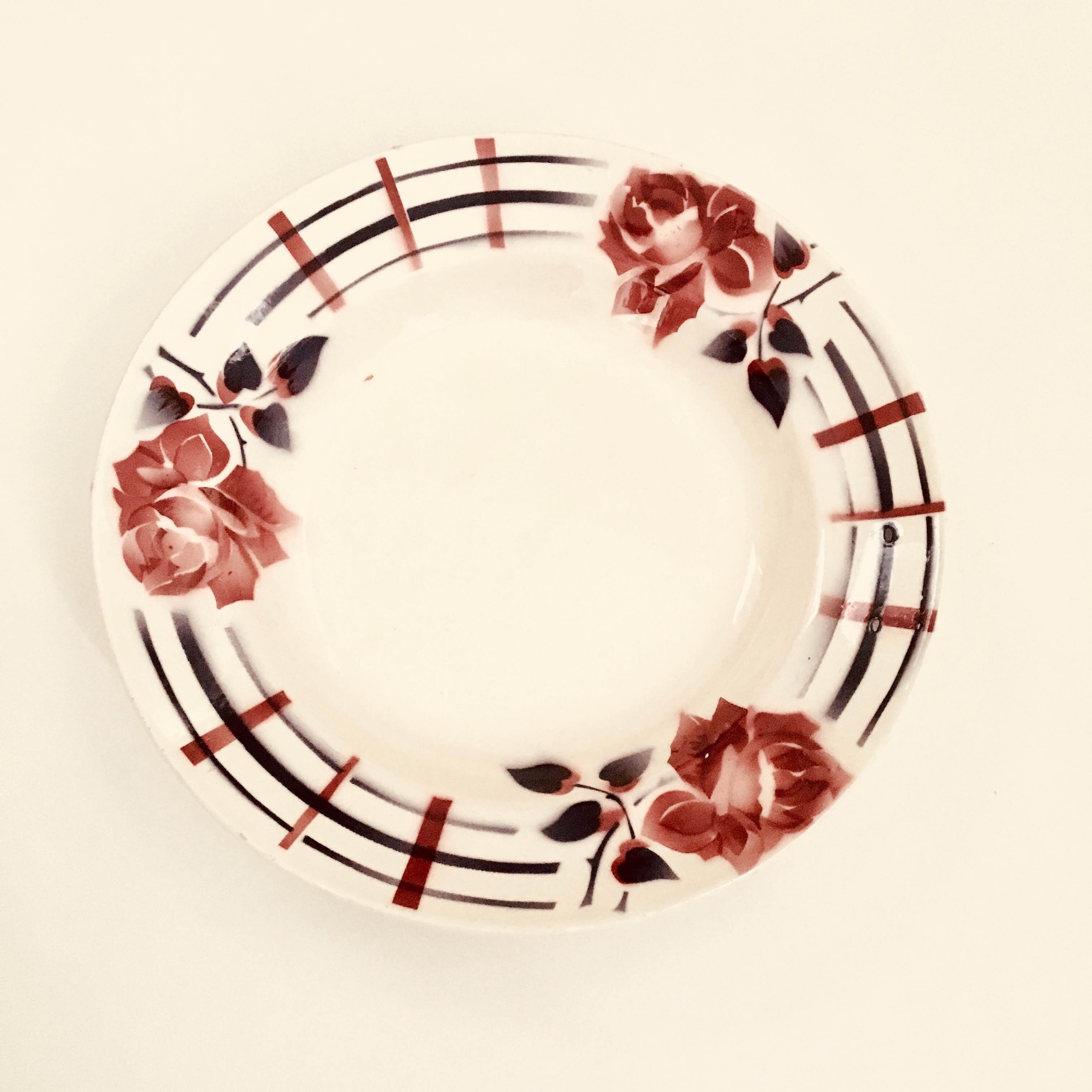 Mismatched hollow plates 1930s