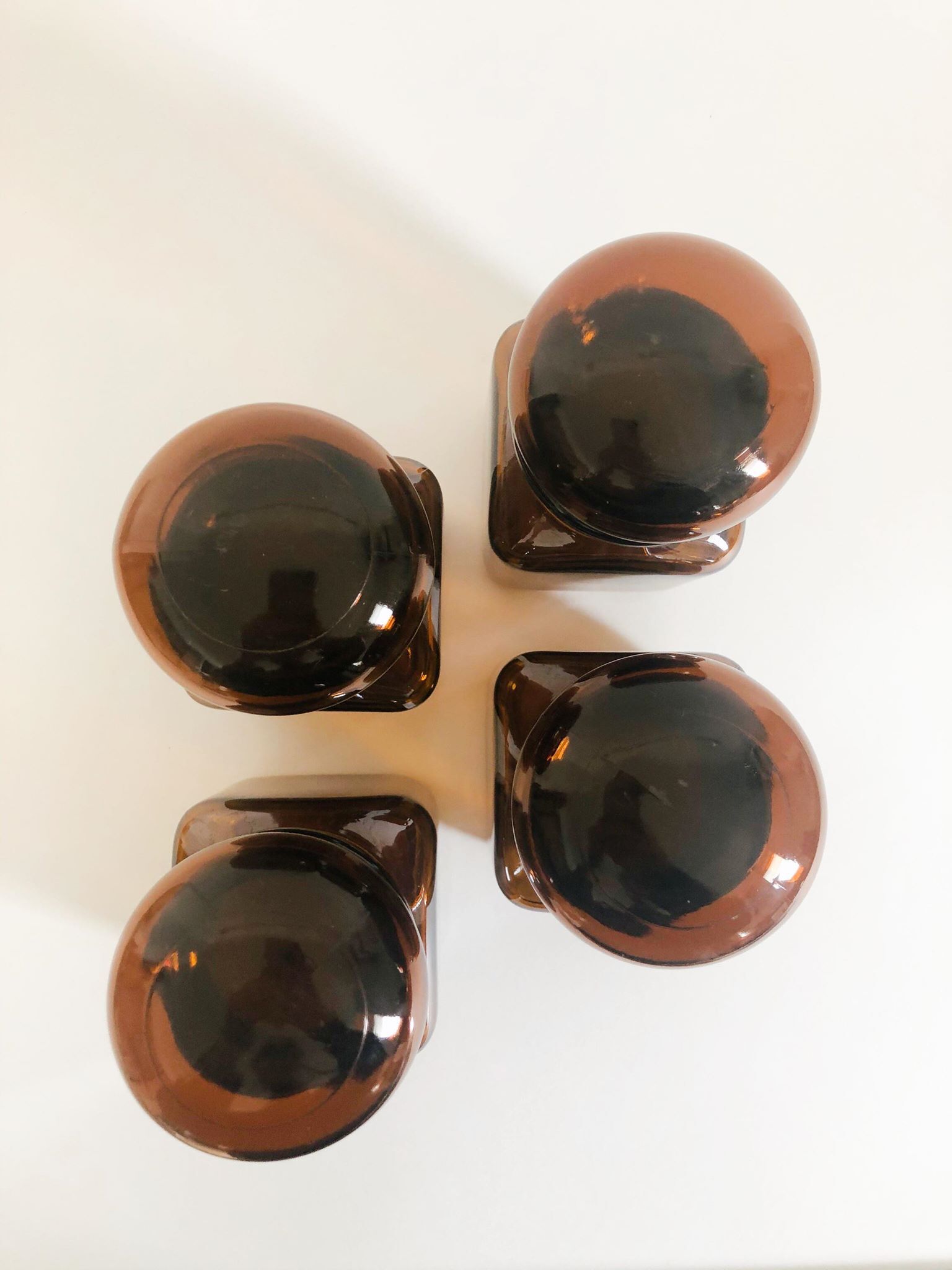 Lot of 4 bottles of amber glass apothecary style