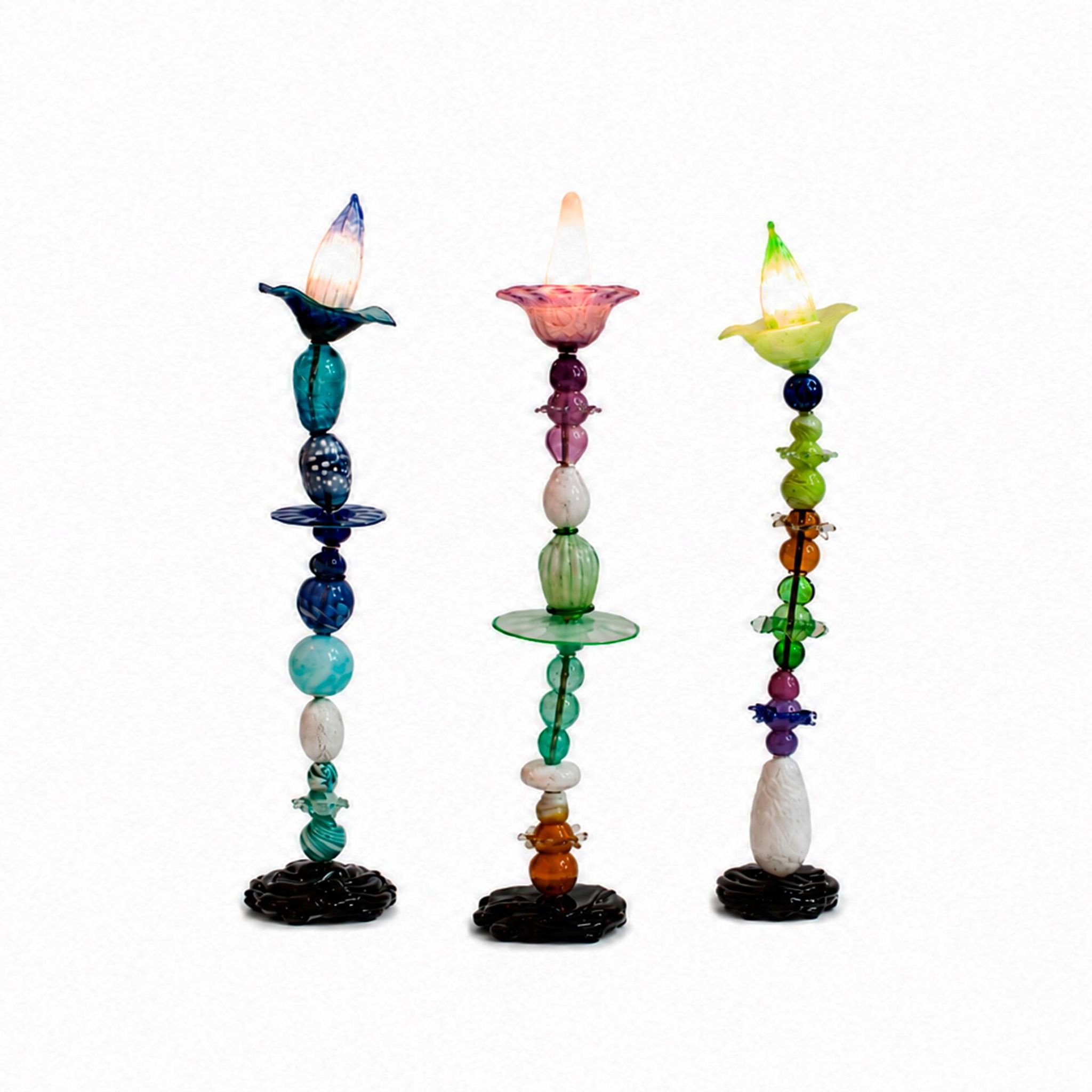 Set of three sculptural multicoloured glass floor lamps in a modernist style.