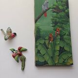Two exotic birds in slip to hang