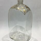 Bouteille en verre décoré de motifs doré