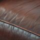 Classic cowhide Chesterfield sofa in English style with red/brown colours