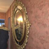 Miroir ovale en bois doré