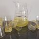Old pitcher with its 8 yellow granite glasses with gold edging vintage 50's