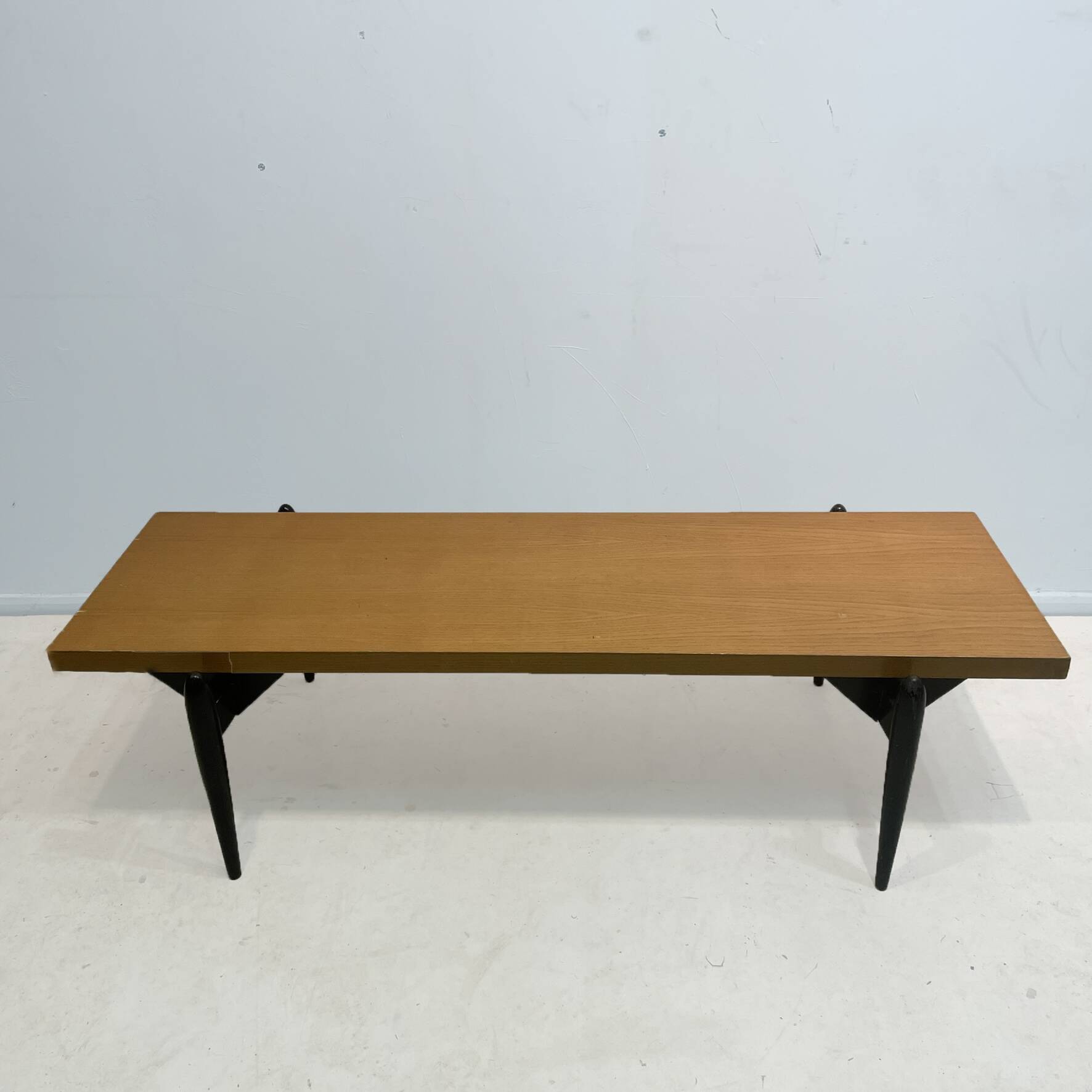 Large 1950s modernist coffee table – sculptural black base