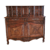 Provençal buffet with two bodies in solid walnut from the 18th century.
