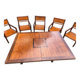 Rectangular dining table set and its suite of 6 armchairs in exotic wood and bamboo.