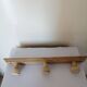 Old wall coat rack in raw wood