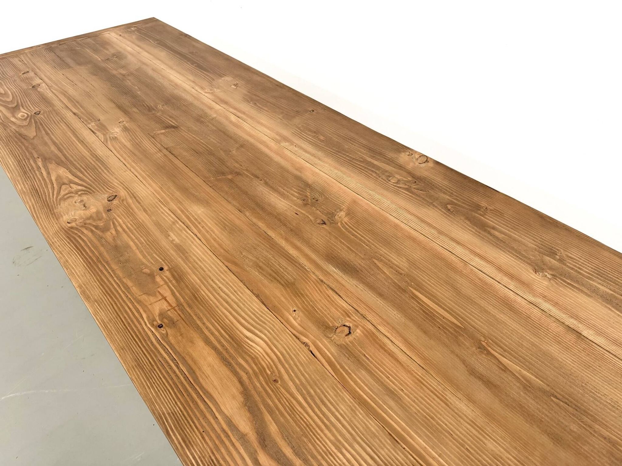 Refectory table in solid pine and beech, with X-shaped legs.