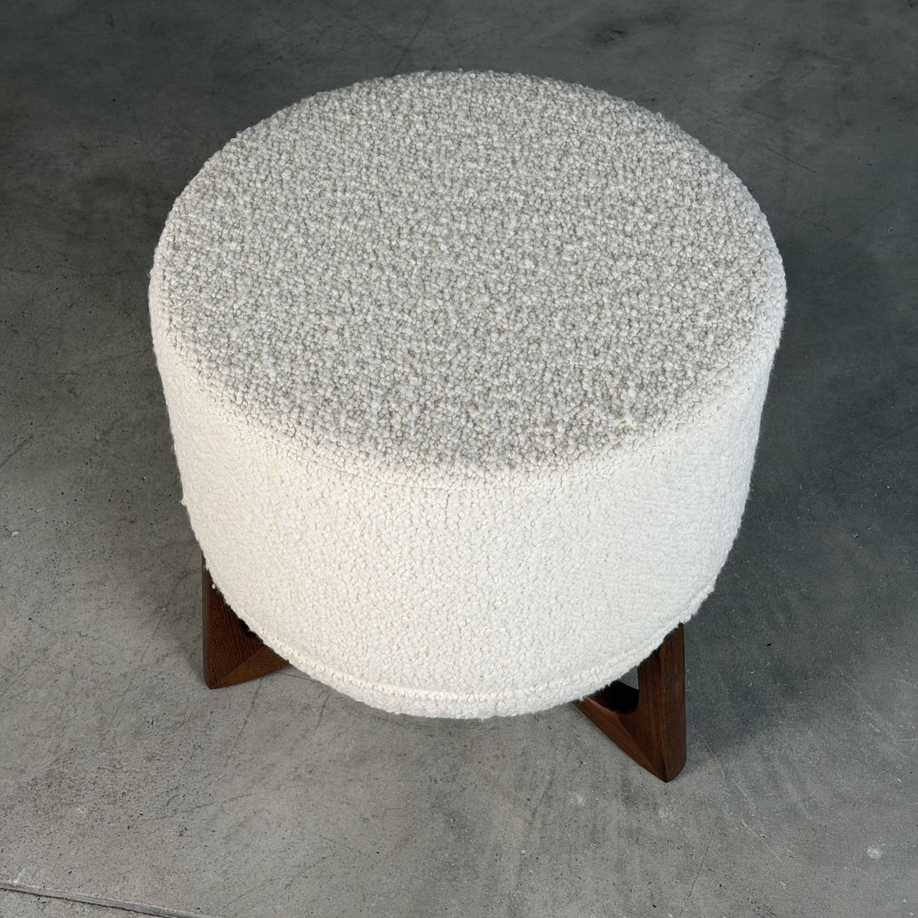 Totemo stool by forme, ivory dedar bouclé upholstery, walnut legs