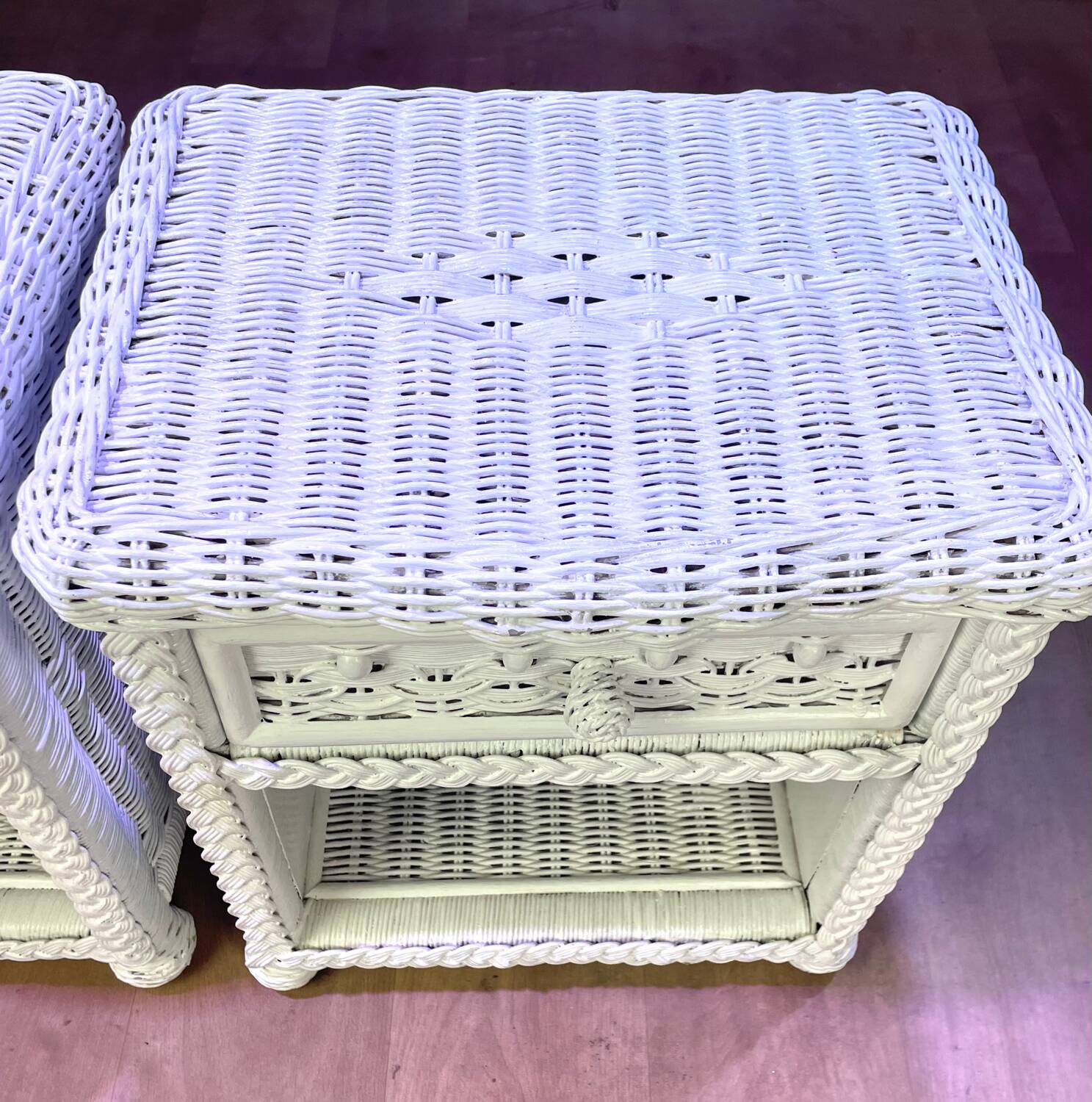 Pair of white lacquered rattan bedside tables