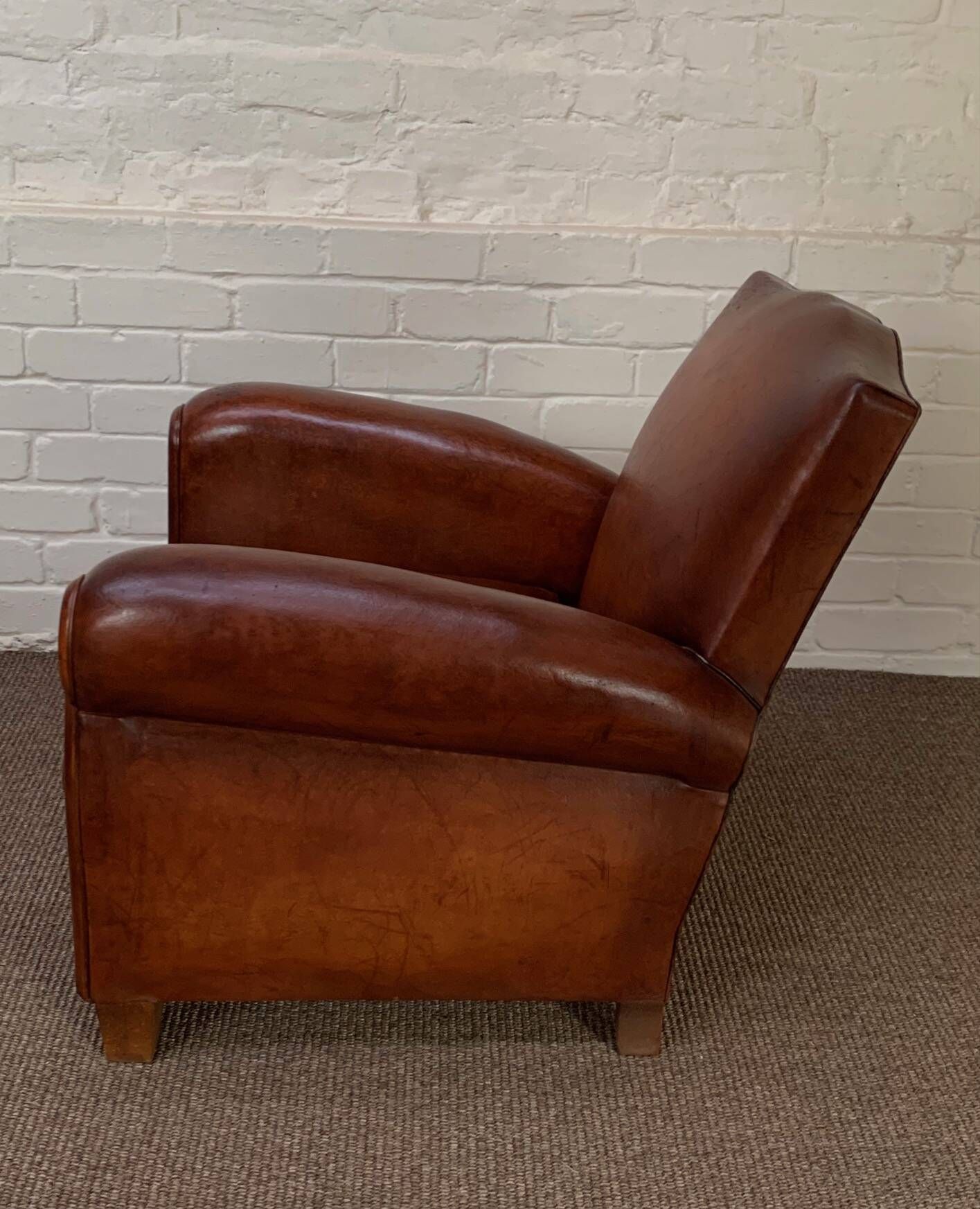 A Beautiful French Leather Club Chair, Moustache Model Circa 1950's