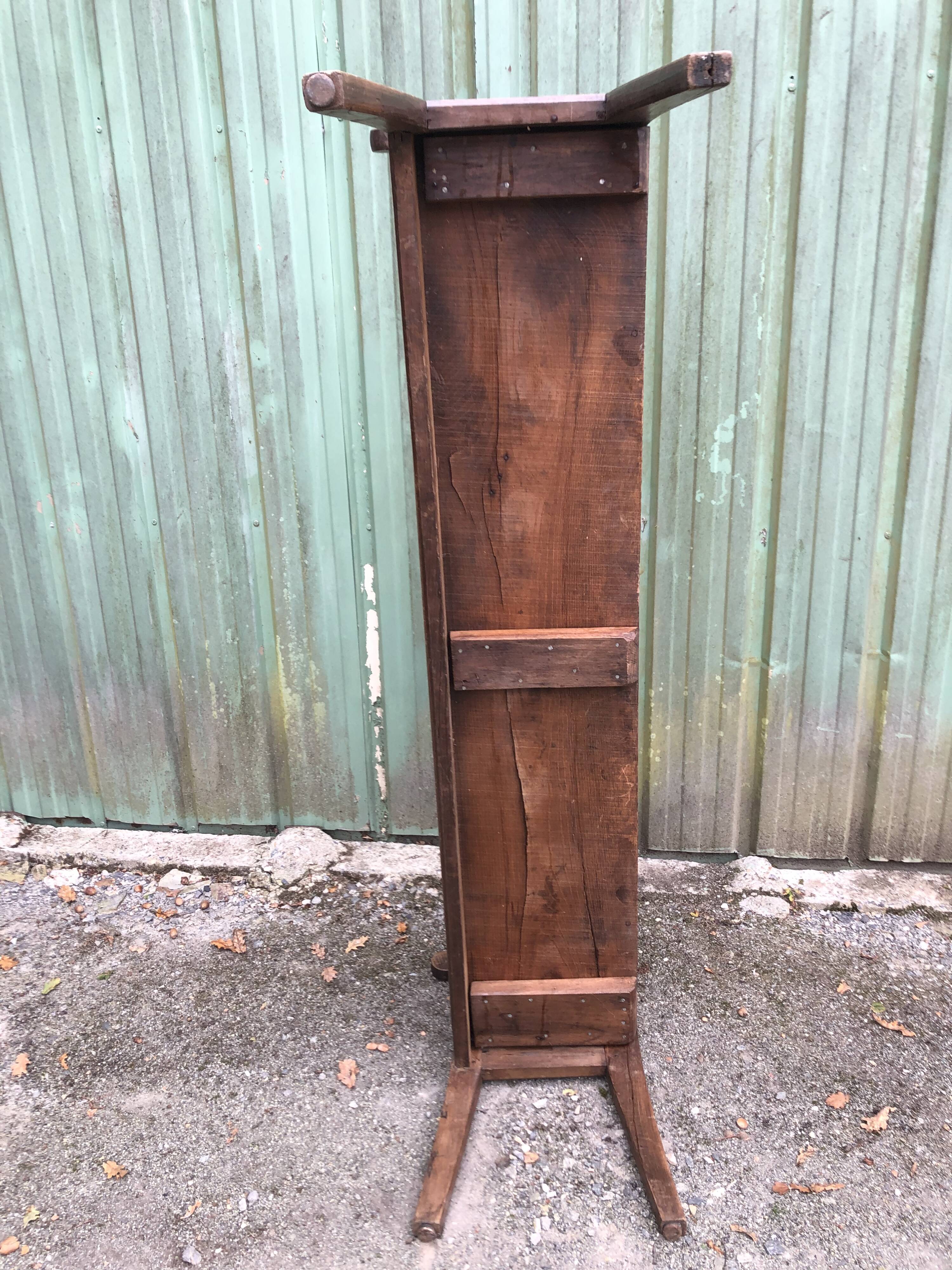 Duo of old solid oak benches with backs and armrests.