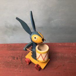 Old wooden wheeled rabbit toy