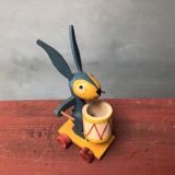 Old wooden wheeled rabbit toy