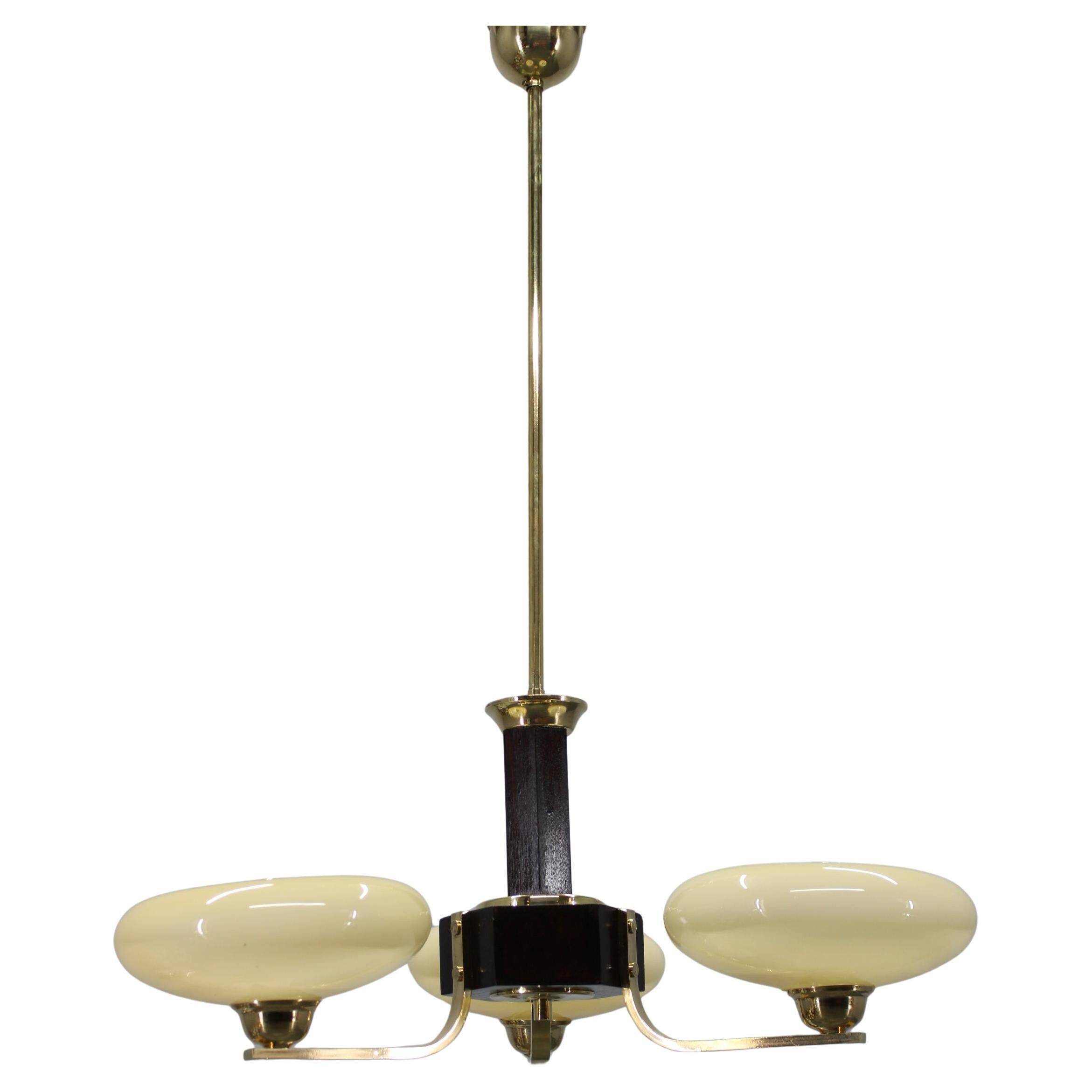 Art Deco brass and wood chandelier with champagne glass, Czechoslovakia 1930s